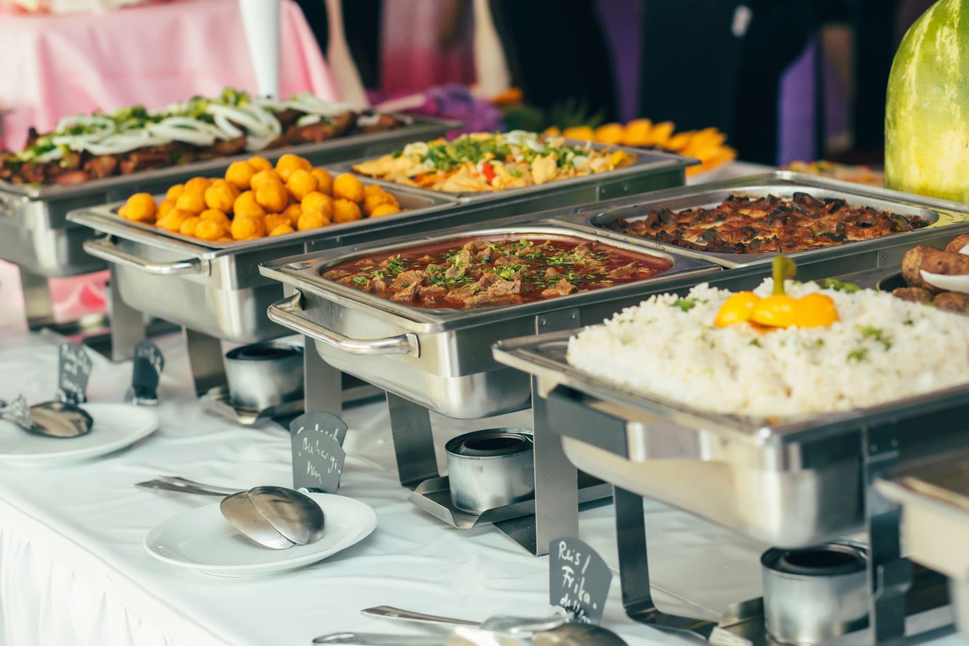 Wedding catering buffet in Lahore with curries, rice and mithai